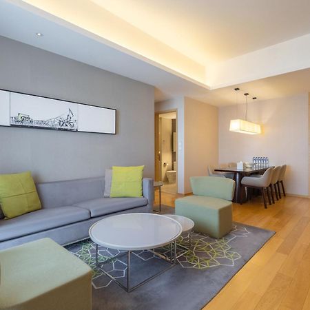 Cm Service Apartment Тяньцзинь Экстерьер фото