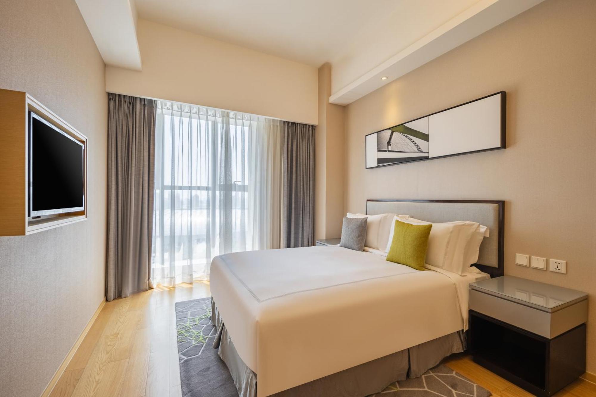 Cm Service Apartment Тяньцзинь Экстерьер фото
