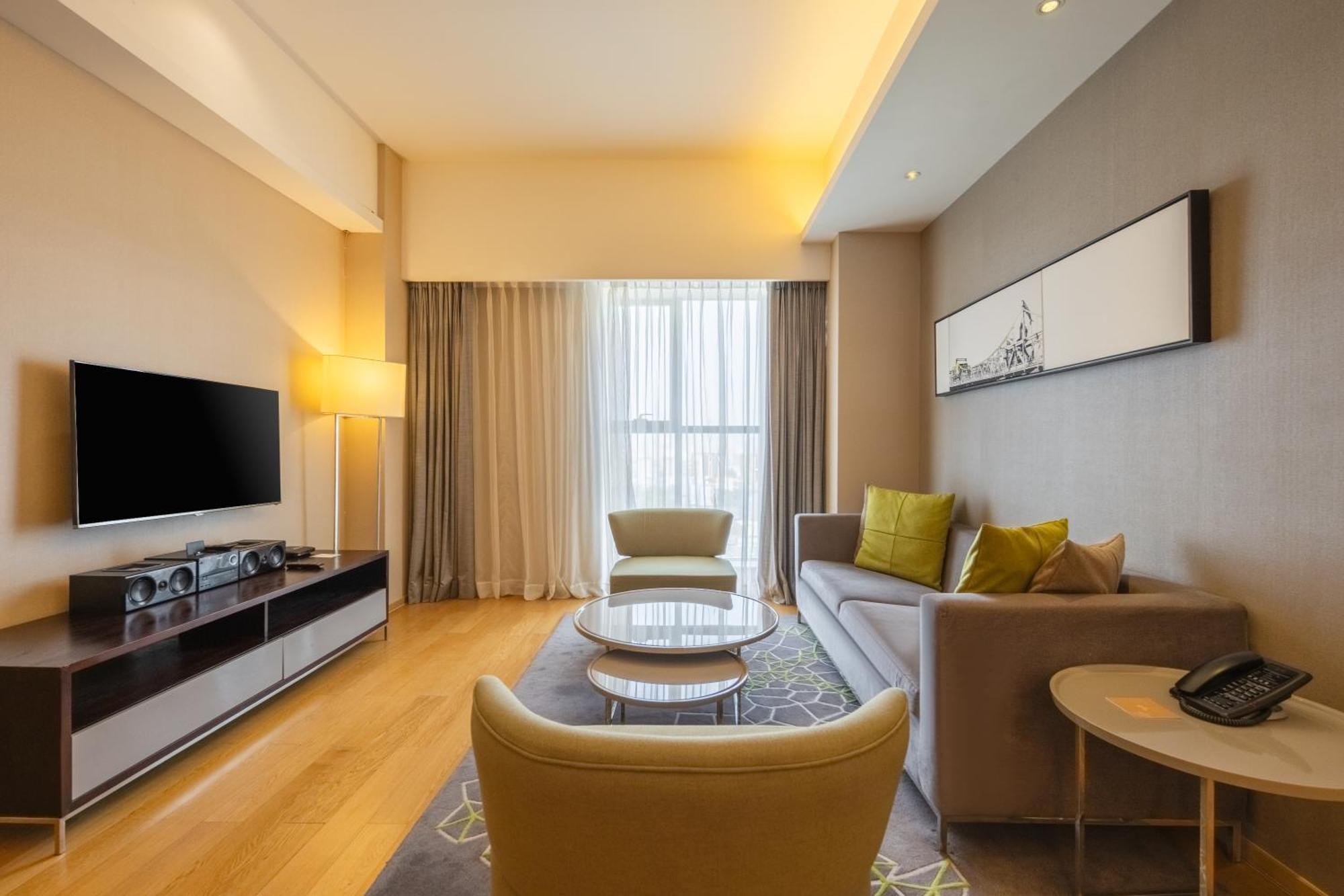 Cm Service Apartment Тяньцзинь Экстерьер фото